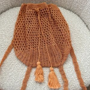 UO Little Orange Crochet Backpack